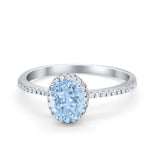 Halo Fashion Ring Oval Simulated Aquamarine CZ Accent 925 Sterling Silver
