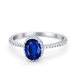 Halo Fashion Ring Oval Simulated Blue Sapphire CZ Accent 925 Sterling Silver